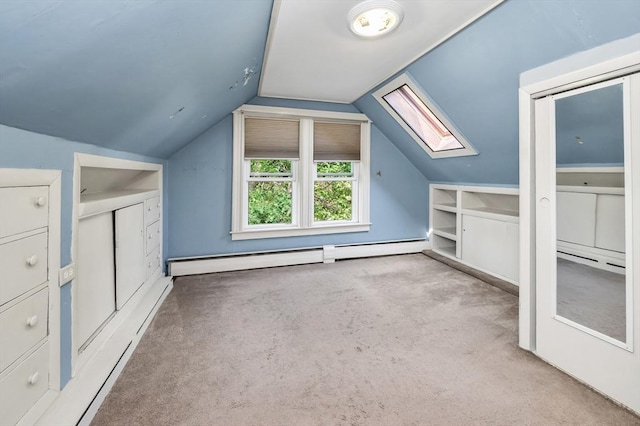 4 3rd Rd, Woburn, MA 01801 - additional living space featuring a skylight, a baseboard radiator, carpet floors, vaulted ceiling, and a baseboard heating unit