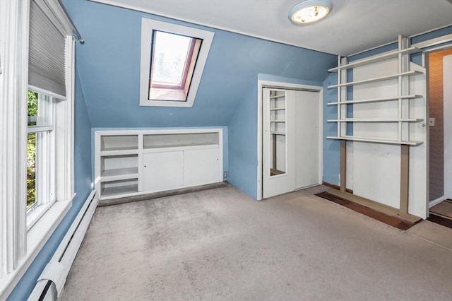 4 3rd Rd, Woburn, MA 01801 - bonus room with a baseboard radiator, lofted ceiling, a skylight, and carpet