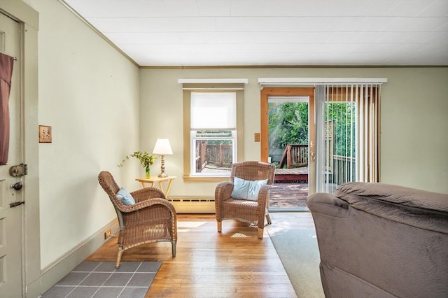 4 3rd Rd, Woburn, MA 01801 - sitting room featuring baseboard heating, wood finished floors, and ornamental molding