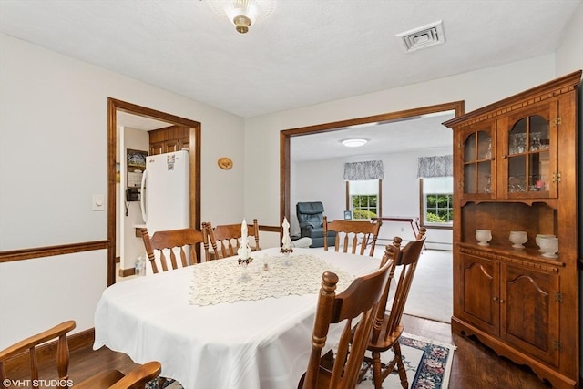 20 Lucia Dr, Milford, MA 01757 - dining space with dark wood-style floors
