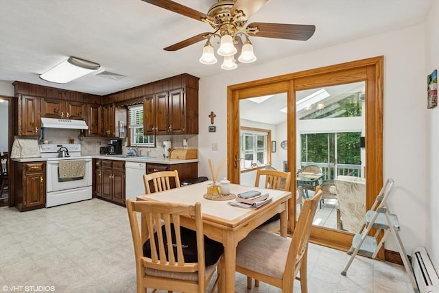 20 Lucia Dr, Milford, MA 01757 - dining space featuring a baseboard heating unit, ceiling fan, healthy amount of natural light, and light floors