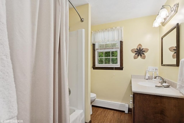 20 Lucia Dr, Milford, MA 01757 - bathroom featuring a baseboard heating unit, wood finished floors, vanity, and shower / bath combo with shower curtain