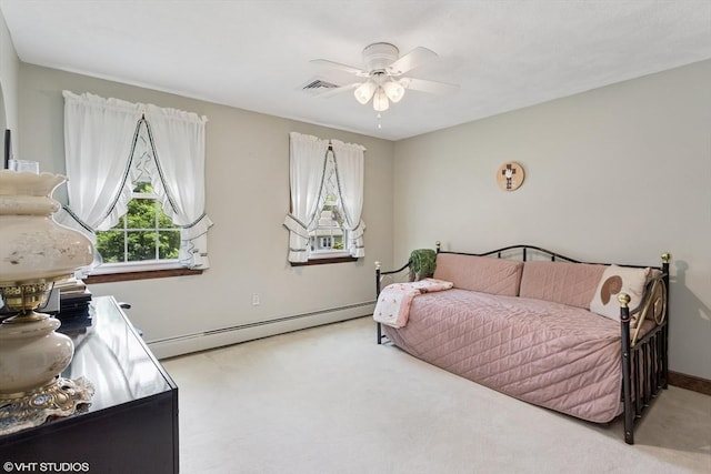 20 Lucia Dr, Milford, MA 01757 - carpeted bedroom with a baseboard heating unit and ceiling fan