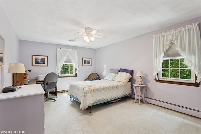20 Lucia Dr, Milford, MA 01757 - carpeted bedroom featuring a baseboard radiator, a desk, and ceiling fan