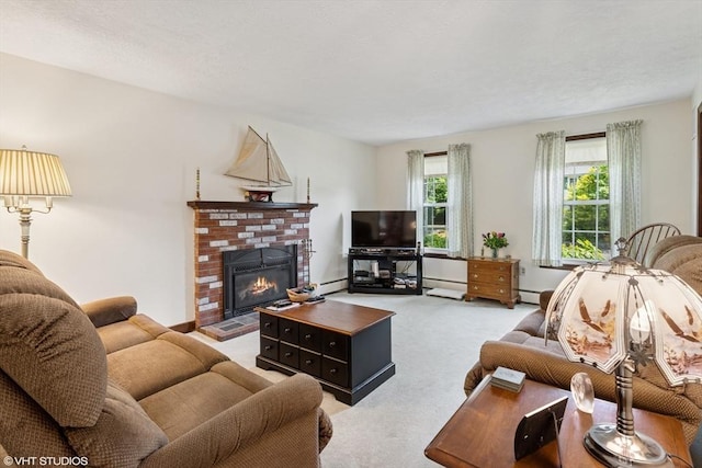 20 Lucia Dr, Milford, MA 01757 - carpeted living area with a fireplace, a baseboard heating unit, and baseboard heating