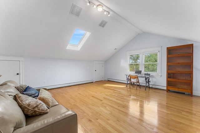 additional living space featuring baseboard heating, visible vents, lofted ceiling with skylight, and light wood-type flooring