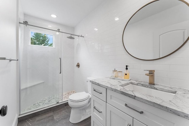 bathroom with a stall shower, tasteful backsplash, toilet, and vanity