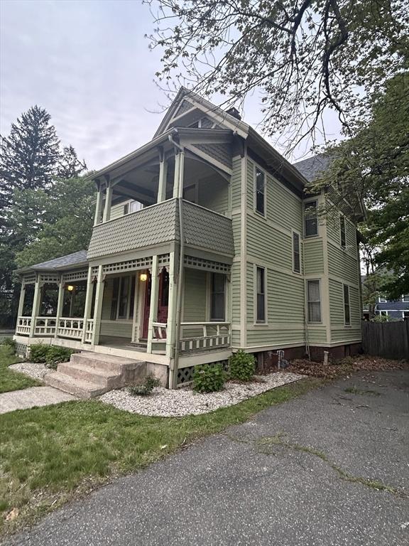 107 Dartmouth, Springfield, MA 01109 - view of side of property with a balcony and a porch