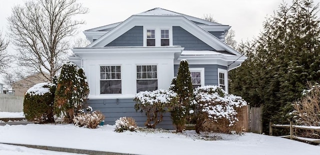 view of snow covered property