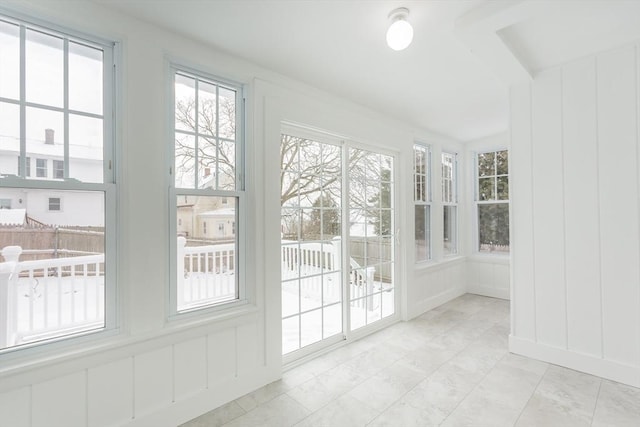 view of unfurnished sunroom