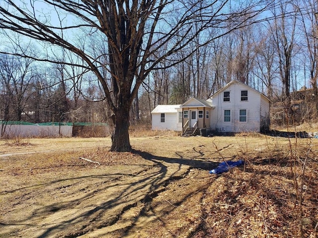 view of yard with entry steps