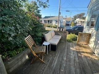 wooden deck with outdoor lounge area