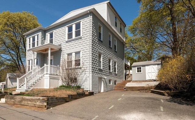 16 Horton St Unit 2, Salem, MA 01970 - view of front of house with stairs, a shed, and an outdoor structure