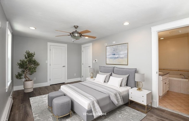 16 Horton St Unit 2, Salem, MA 01970 - bedroom featuring a baseboard radiator, wood finished floors, recessed lighting, ensuite bath, and ceiling fan