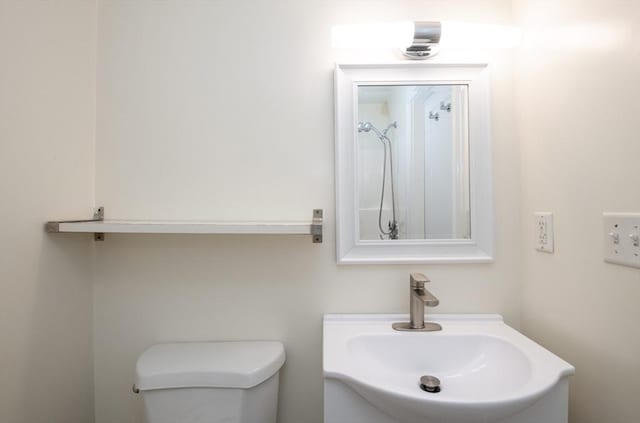 16 Horton St Unit 2, Salem, MA 01970 - bathroom featuring toilet, a shower, and vanity