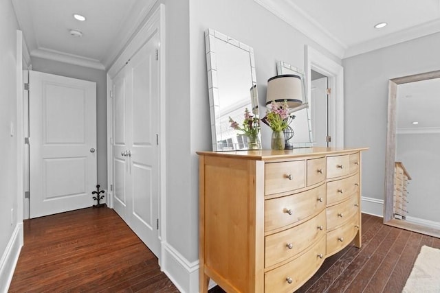 hallway with recessed lighting, dark wood-style floors, and ornamental molding