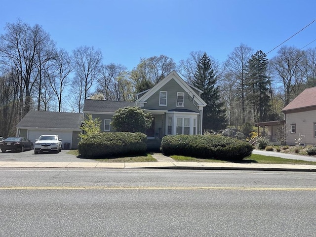 front of property with a garage