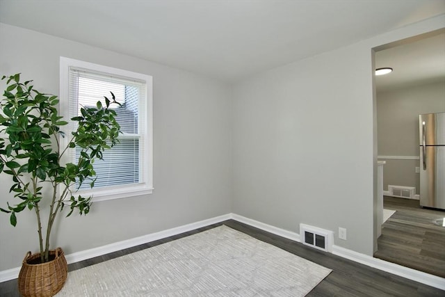 100 Haskin St, Springfield, MA 01109 - unfurnished room with wood finished floors and baseboards
