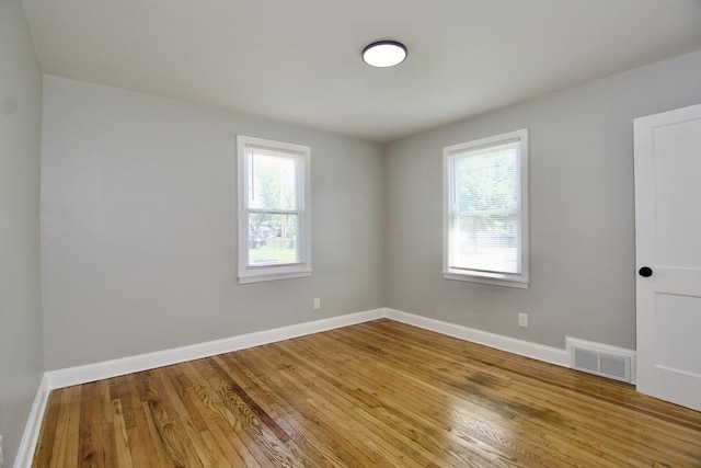 100 Haskin St, Springfield, MA 01109 - unfurnished room with healthy amount of natural light and wood finished floors