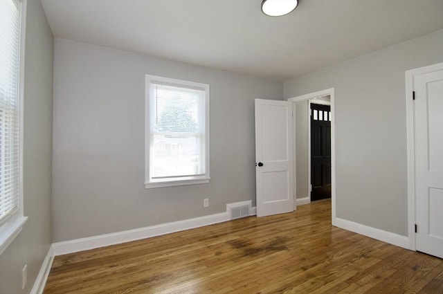 100 Haskin St, Springfield, MA 01109 - unfurnished bedroom featuring wood finished floors and baseboards