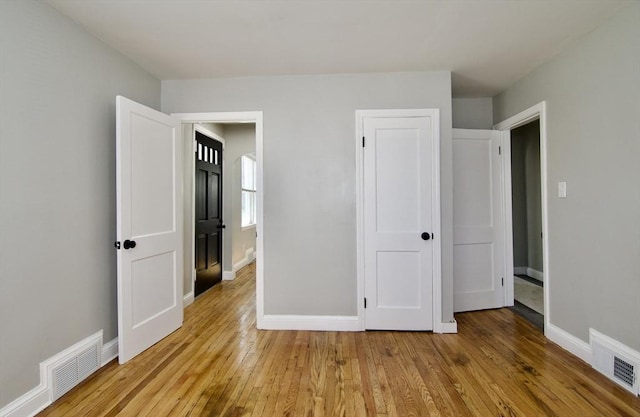 100 Haskin St, Springfield, MA 01109 - unfurnished bedroom with wood-type flooring