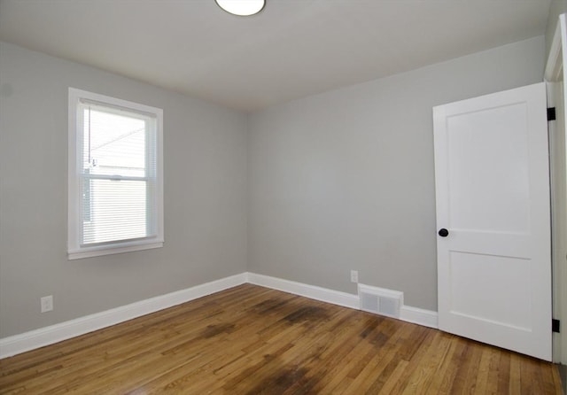 100 Haskin St, Springfield, MA 01109 - empty room featuring wood finished floors and baseboards