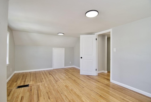 100 Haskin St, Springfield, MA 01109 - bonus room with light wood-style floors and vaulted ceiling