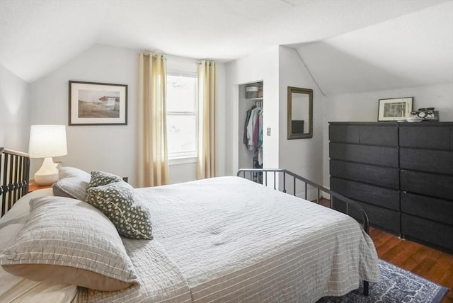 24 Everett St, Woburn, MA 01801 - bedroom with vaulted ceiling, wood finished floors, and a closet