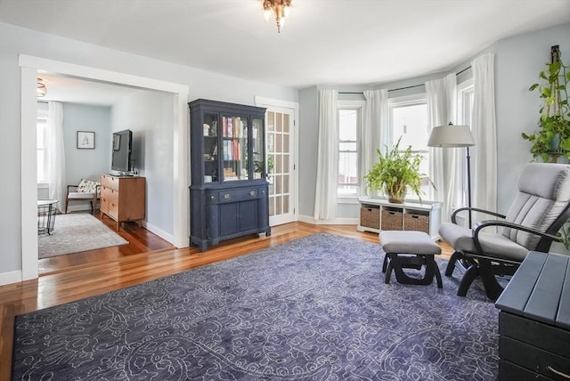 24 Everett St, Woburn, MA 01801 - sitting room with wood finished floors and baseboards