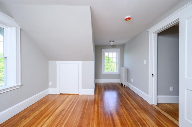 9 School St, Hull, MA 02045 - bonus room with baseboards, light wood-style flooring, and radiator heating unit