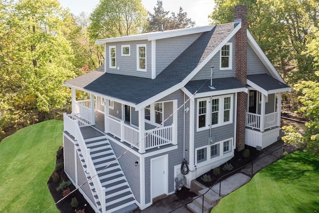 9 School St, Hull, MA 02045 - back of house featuring a shingled roof, stairway, a chimney, covered porch, and a yard