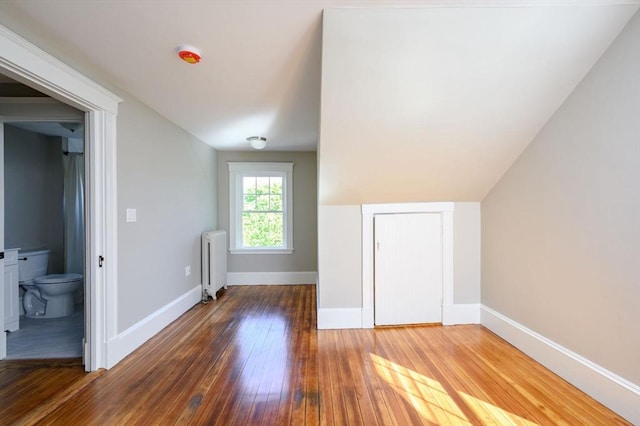 9 School St, Hull, MA 02045 - additional living space with radiator, baseboards, and wood-type flooring