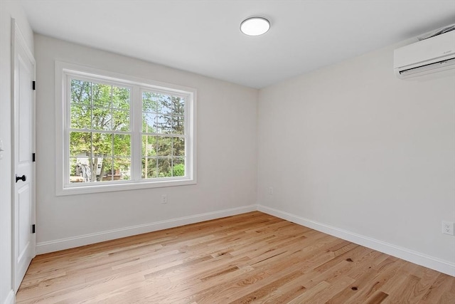 7 S Porter St Unit 7, Haverhill, MA 01835 - spare room featuring light wood-style floors and an AC wall unit