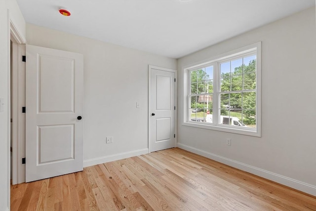 7 S Porter St Unit 7, Haverhill, MA 01835 - unfurnished bedroom with baseboards and light wood finished floors