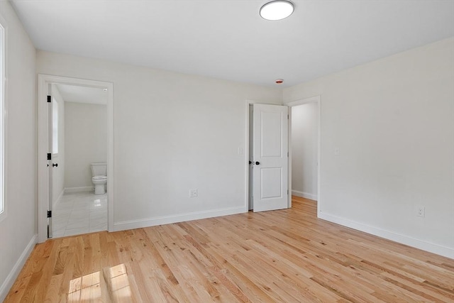 7 S Porter St Unit 7, Haverhill, MA 01835 - empty room with light wood finished floors and baseboards