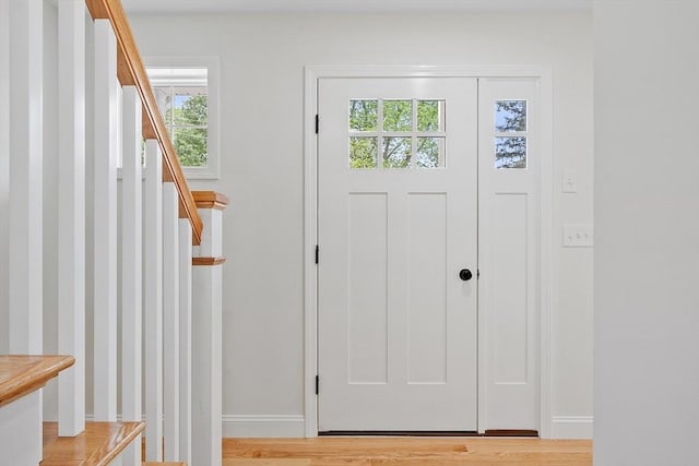7 S Porter St Unit 7, Haverhill, MA 01835 - foyer featuring plenty of natural light, stairway, and light wood finished floors
