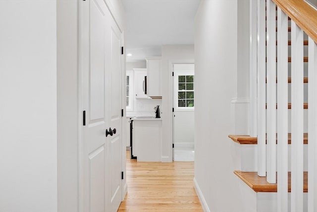 7 S Porter St Unit 7, Haverhill, MA 01835 - hallway with light wood-style flooring and baseboards