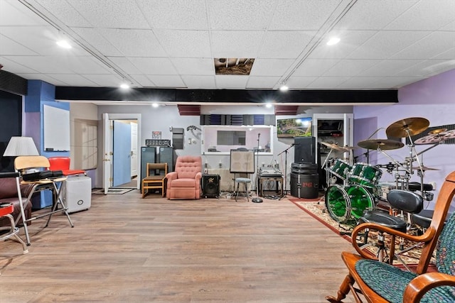 interior space featuring track lighting and wood finished floors