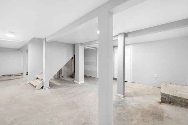 finished basement featuring stairway