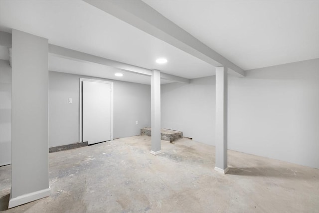 finished basement with recessed lighting