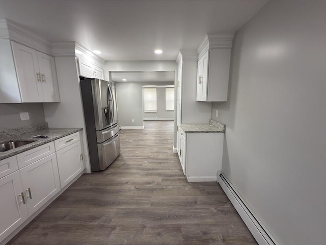 103 Pleasent, Woonsocket, RI 02895 - kitchen featuring stainless steel fridge, white cabinetry, dark wood-type flooring, baseboard heating, and recessed lighting