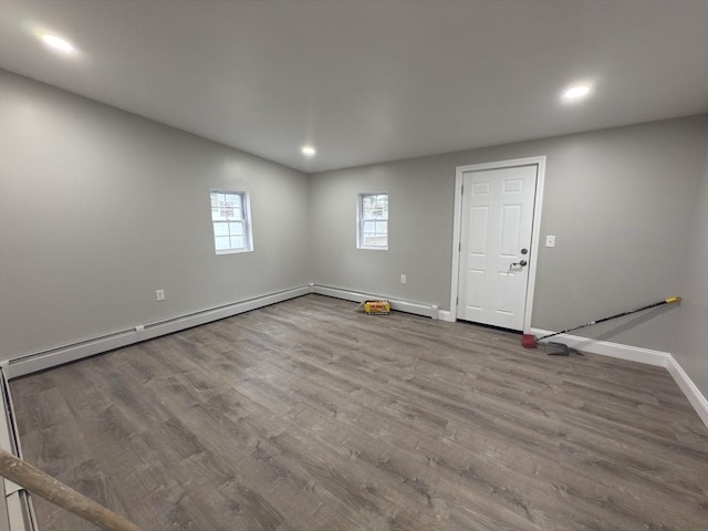 103 Pleasent, Woonsocket, RI 02895 - foyer featuring baseboards, wood finished floors, recessed lighting, and a baseboard heating unit