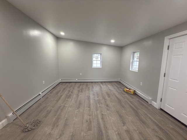103 Pleasent, Woonsocket, RI 02895 - unfurnished room with wood finished floors, baseboards, recessed lighting, and baseboard heating