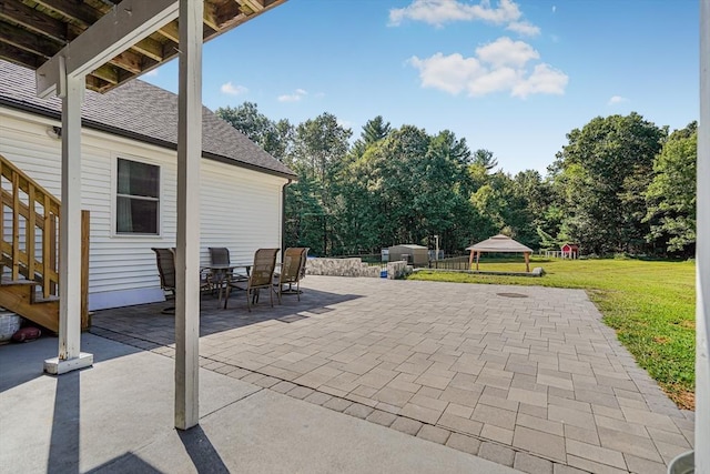 view of patio / terrace featuring a gazebo and outdoor dining space