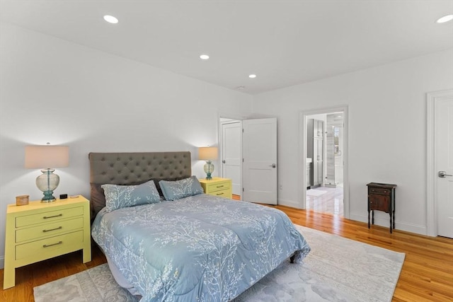 751 Sharps Lot Rd, Swansea, MA 02777 - bedroom with wood finished floors, recessed lighting, and connected bathroom