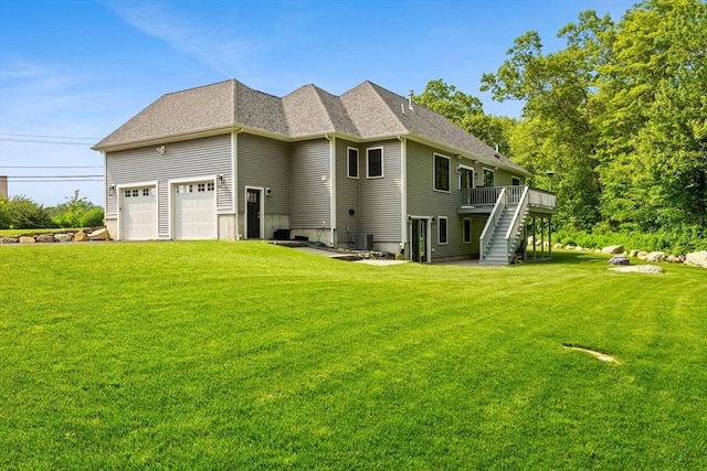 751 Sharps Lot Rd, Swansea, MA 02777 - back of property with stairway, a wooden deck, a yard, and a garage