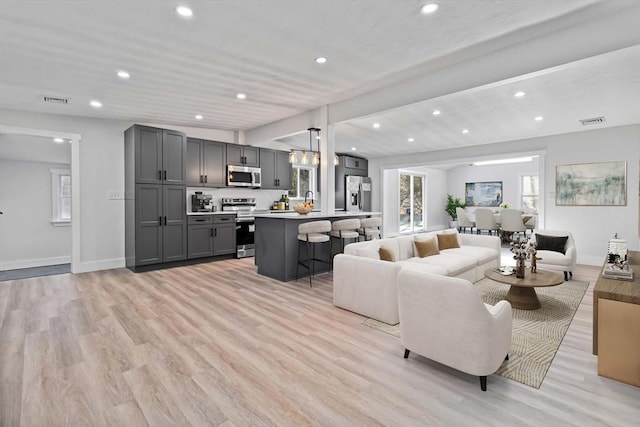 living room featuring light hardwood / wood-style floors