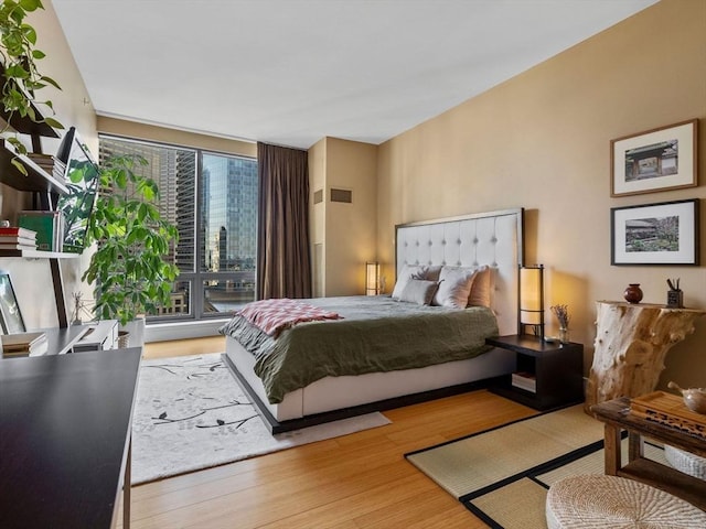 bedroom featuring wood finished floors