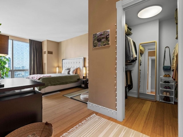 bedroom featuring wood finished floors