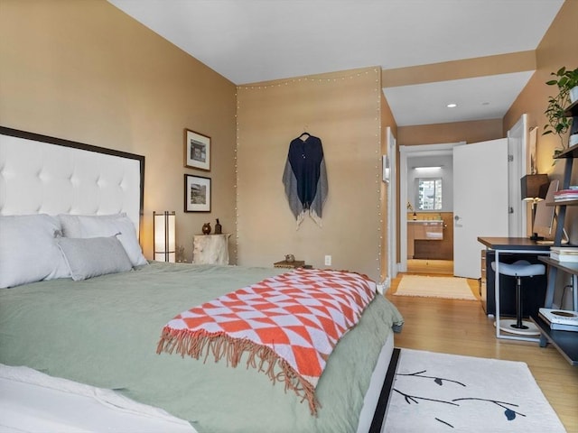 bedroom featuring wood finished floors